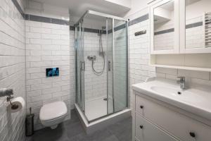 
Ein Badezimmer in der Unterkunft Maxymilian Unique Hotel
