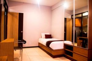 Voodi või voodid majutusasutuse Valore Hotel toas