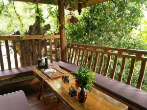 Balkón nebo terasa v ubytování Bridge View Boutique Guesthouse 望桥楼精品民宿