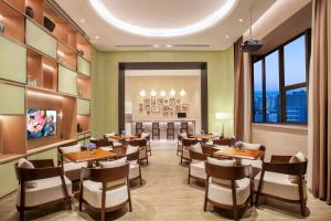 A restaurant or other place to eat at Somerset Aparthotel Xindicheng Xi'an