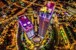 an aerial view of a city at night at Swiss-Garden Hotel Melaka in Melaka