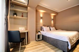 Cama o camas de una habitación en Luxury Skopje Apartments