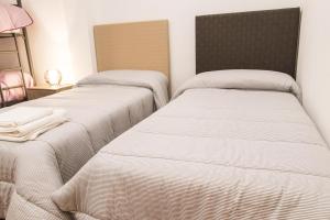 Postel nebo postele na pokoji v ubytování Apartamento Completo Boquerón de Granada