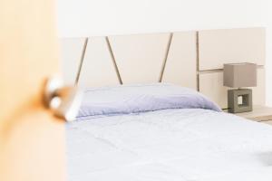 Postel nebo postele na pokoji v ubytování Apartamento Completo Boquerón de Granada