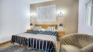 Postel nebo postele na pokoji v ubytování Edificio Prieto Vivienda 2D + 15 fotografií