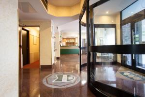 A bed or beds in a room at Residence Desenzano