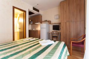 A bed or beds in a room at Residence Desenzano