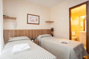 A bed or beds in a room at Residence Desenzano