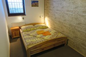 Postel nebo postele na pokoji v ubytování Apartmany Jasna Veverica