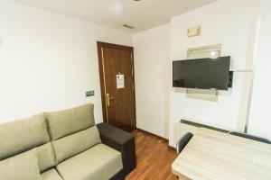 TV a/nebo společenská místnost v ubytování Apartamento Completo Boquerón de Granada