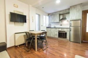 Kuchyň nebo kuchyňský kout v ubytování Apartamento Completo Boquerón de Granada