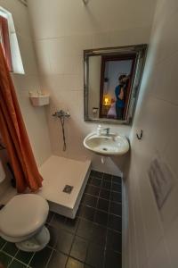 Kúpeľňa v ubytovaní Caesar Apartments & Rooms