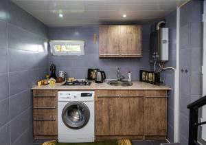 Kuchyň nebo kuchyňský kout v ubytování Apartment Lui