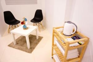 Posezení v ubytování Zhuji Hostel + 27 fotografií