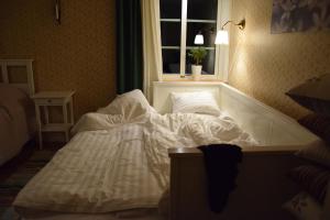 Letto o letti in una camera di Kronobo