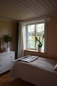 Letto o letti in una camera di Kronobo