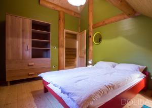 Postel nebo postele na pokoji v ubytování Country House Doliba