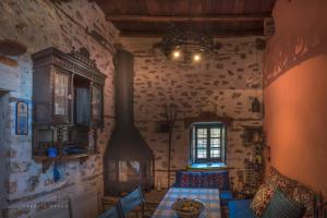 A seating area at Urania Traditional Stone House