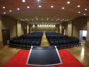 a large room with chairs and a laptop on a red carpet at The Kooralbyn Valley in Kooralbyn +43 photos