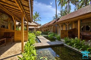 Zahrada ubytování Benthos Bali Dive Resort