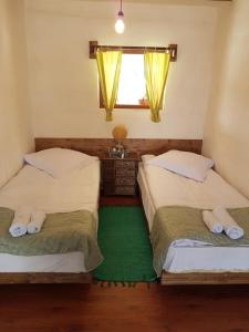 Tempat tidur dalam kamar di Hotel Bashinjaghyan