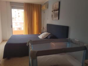 Postel nebo postele na pokoji v ubytování Hotel L'Escala