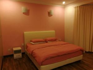 Vistana Residence, Bayan Lepas Penang tesisinde bir odada yatak veya yataklar