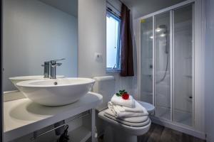 Koupelna v ubytování Camping Internazionale Etruria + 37 fotografií