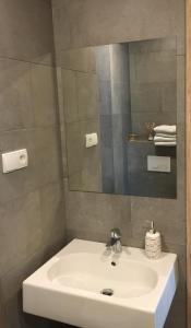 Kúpeľňa v ubytovaní Dado Apartments + 13 fotografií