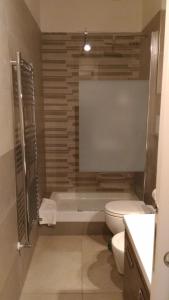 Kúpeľňa v ubytovaní Apartment Corso Cavour