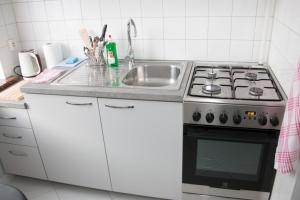 Cuina o zona de cuina de Apartament Rajska Centrum