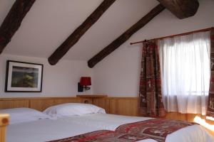 Postel nebo postele na pokoji v ubytování Hôtel Bruxelles