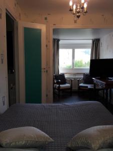 Afbeelding uit fotogalerij van Chambres d'Hôtes du Moulin du Vey in Clécy