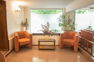 Uma área de estar em Hotel Princess