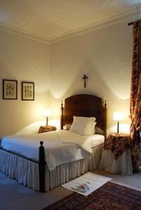 Кровать или кровати в номере Casa do Cimo