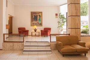 Uma área de estar em Hotel Princess