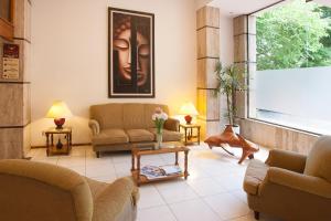 Uma área de estar em Hotel Princess