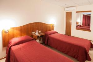 Cama ou camas em um quarto em Hotel Princess