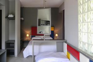 Ένα ή περισσότερα κρεβάτια σε δωμάτιο στο Design Architectonika