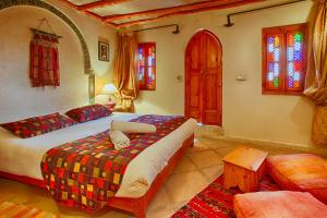 Cama o camas de una habitación en Riad Kenzo