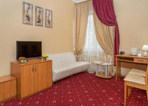 Postel nebo postele na pokoji v ubytování Shine Hotel
