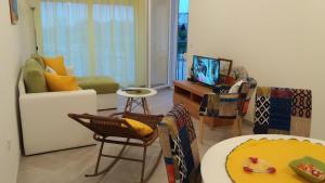 TV i/ili multimedijalni sistem u objektu Apartments Maljevic