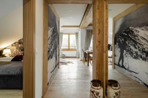 Posteľ alebo postele v izbe v ubytovaní udanypobyt Apartamenty Tuwima