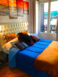 Łóżko lub łóżka w pokoju w obiekcie BOOKINGHAM ★Apartaments & Suites