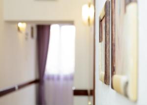 Postel nebo postele na pokoji v ubytování Shine Hotel