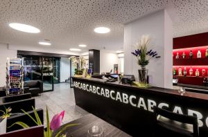 De lobby of receptie bij ABC Swiss Quality Hotel