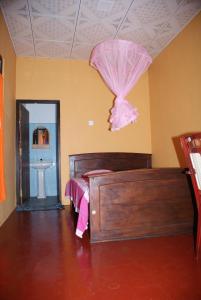 Postel nebo postele na pokoji v ubytování Kalpitiya Guest House