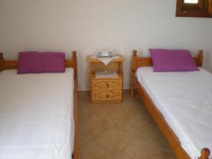 Postel nebo postele na pokoji v ubytování Patmos Garden Sea