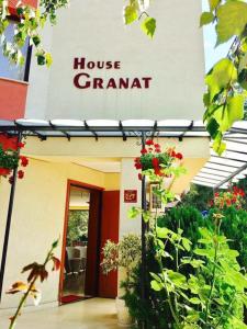 a house grant sign on the front of a building at Guest House Granat in Sunny Beach