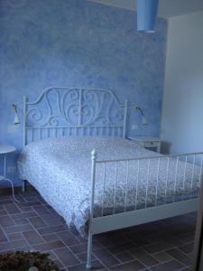 Ліжко або ліжка в номері Conero Mare Verde